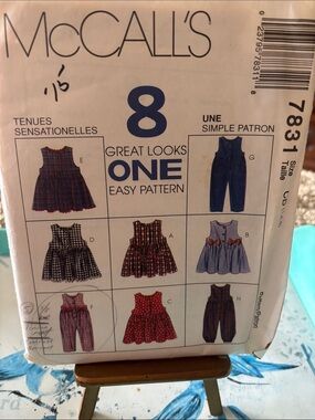 sewing pattern for toddler jumpers & jumpsuits with 8 different design options.